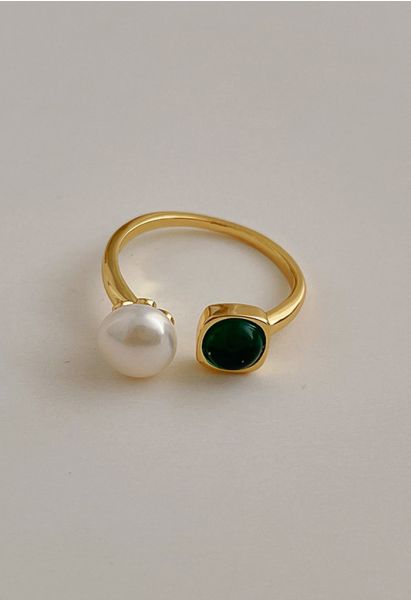Jóia de esmeralda e anel aberto de pérolas