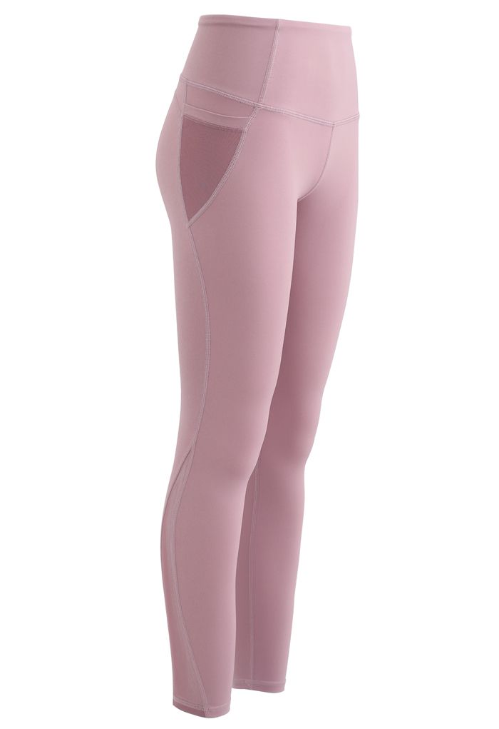 Legging com bolsos de malha e cintura alta com detalhe de costura até o tornozelo em rosa empoeirado
