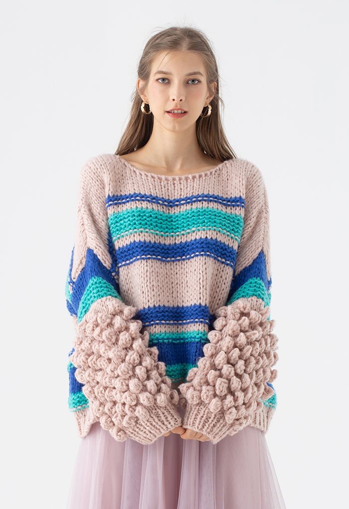 Suéter robusto de tricot à mão com manga pom-pom