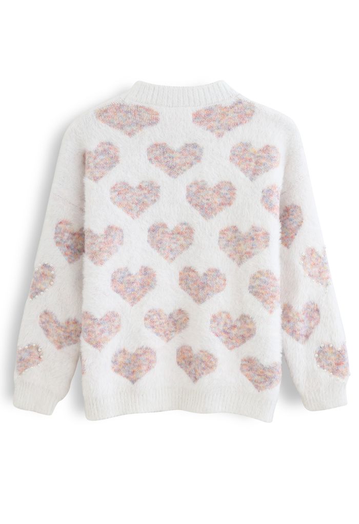Suéter de malha com detalhes em pérolas de coração rosa felpudo