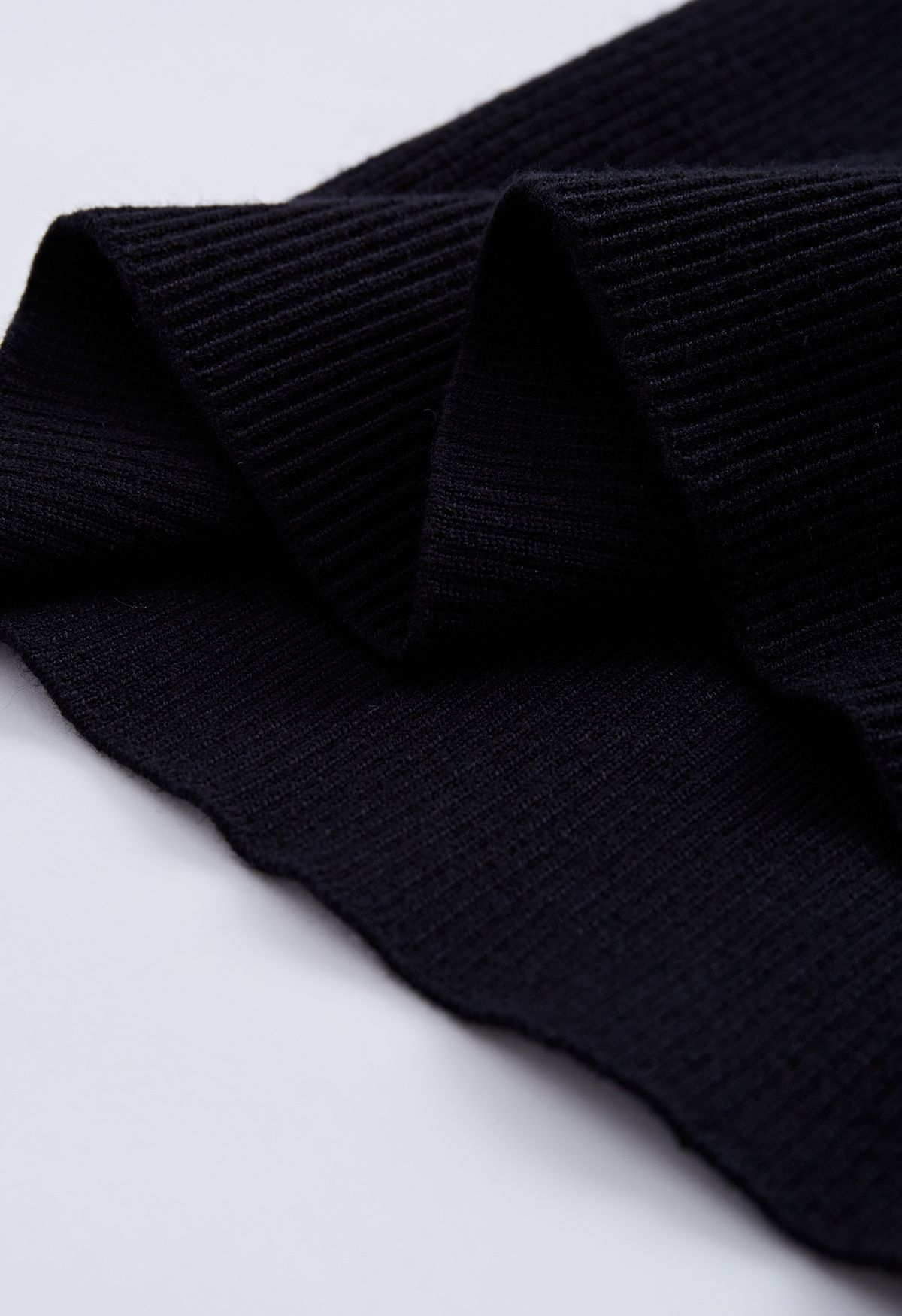 Blusa de malha com botões e mangas borbulhantes em preto