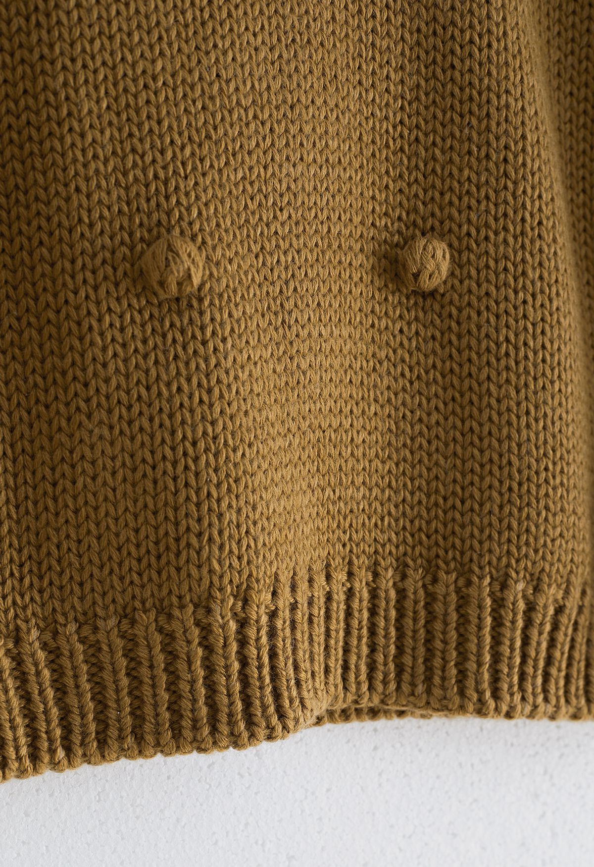 Suéter Pom-Pom tricotado à mão em caramelo para crianças
