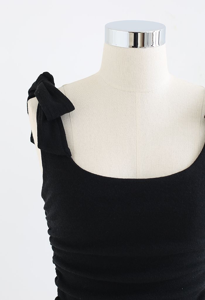 Blusa camuflada com laço lateral e amarração em preto
