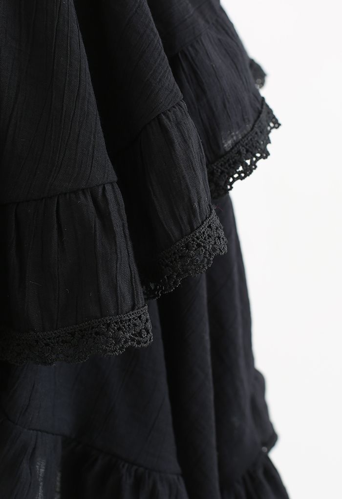 Mini-saia assimétrica Lacy Edge em preto