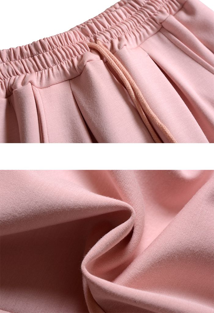 Calças retas de cintura com cordão em rosa