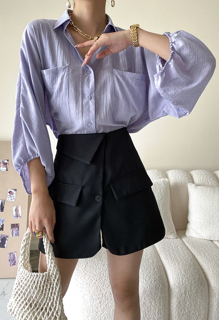 Mini-saia cintura alta bolso com aba preta