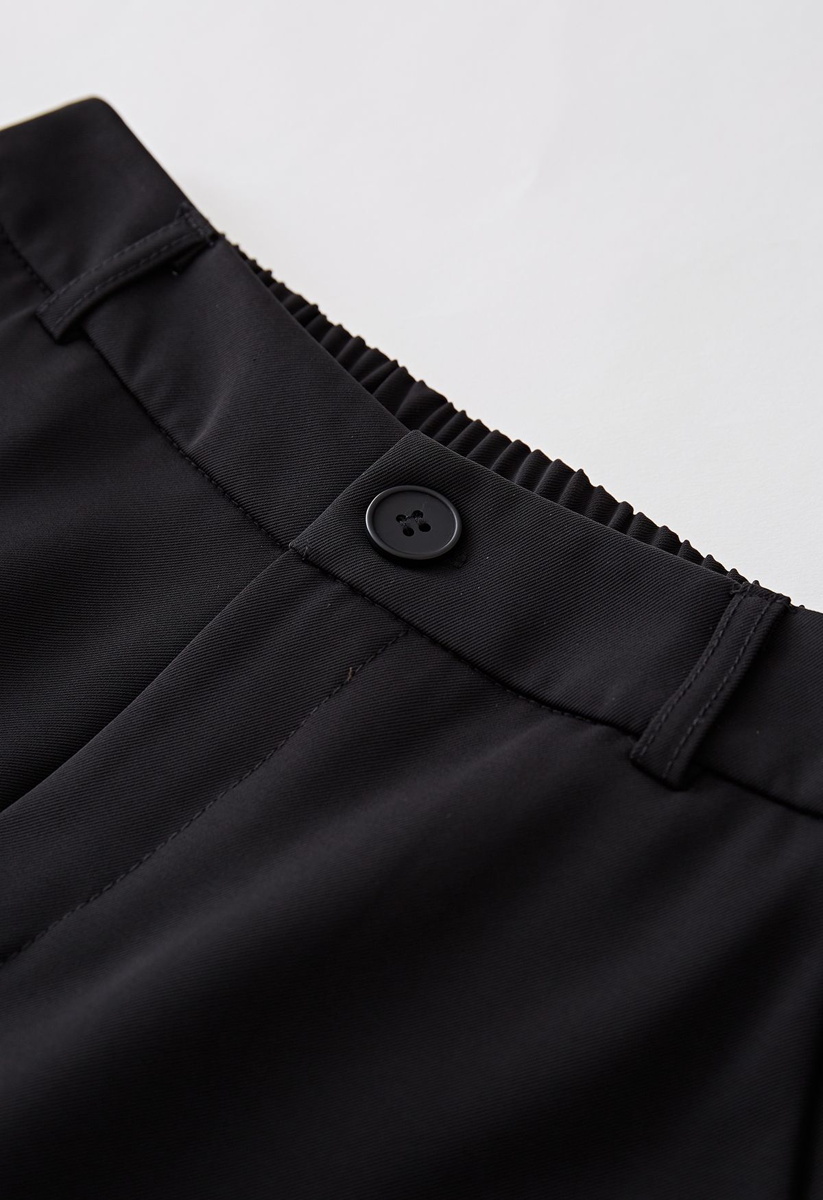 Calça flare cintura meio elástica em preto