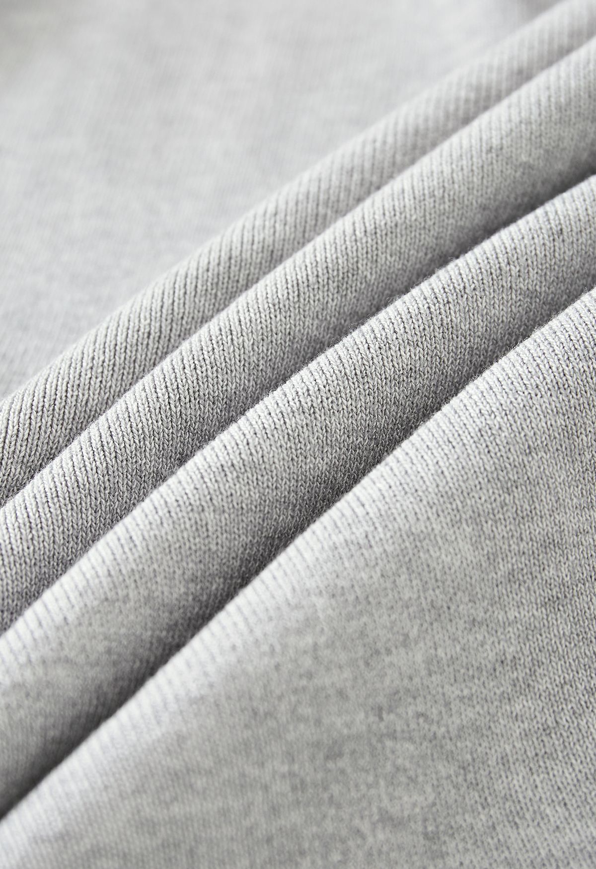 Cardigan de tricô com lapela larga e cintura em cinza
