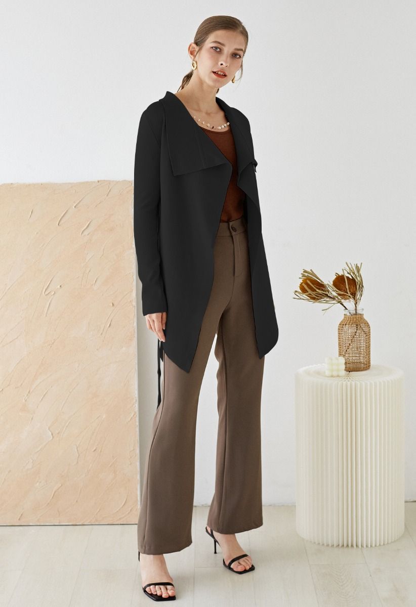 Cardigan de tricô com lapela larga e cintura em preto