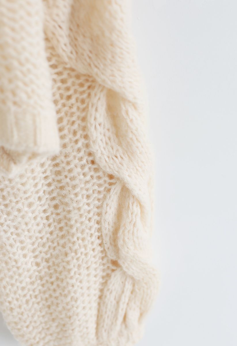 Suéter de mangas bufantes tricotado à mão em creme