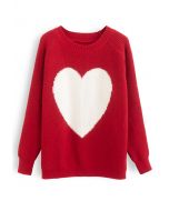 Suéter oversized de tricô de um coração em vermelho